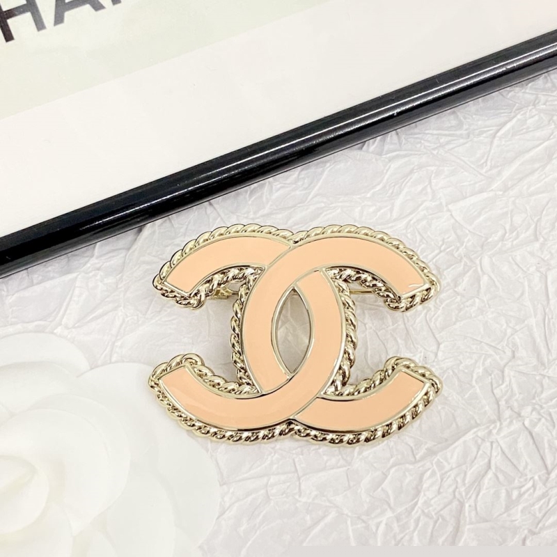 Ch*el brooches